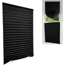 Store plissé occultant sans perçage coloris noir pour assombrir une fenêtre